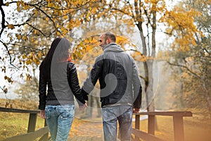 Happy middle-aged couple on autumn day