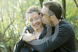 Happy middle aged couple outdoors on beautiful