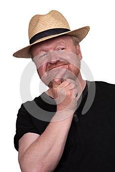 Happy middle aged man in straw hat