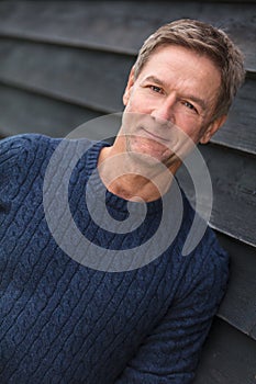 Happy Middle Aged Man Wearing Blue Sweater