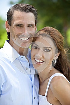 Happy Middle Aged Man and Woman Couple Outside