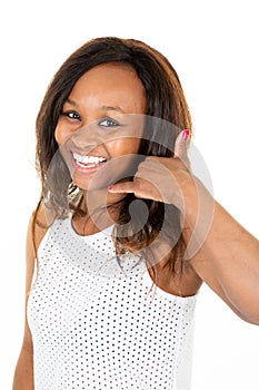 Happy mixed race american african woman makes call me gesture with hand