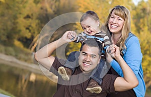 Happy Mixed Race Ethnic Family Outdoors