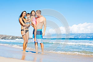 Happy Mixed Race Family on the Beach