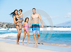 Happy Mixed Race Family on the Beach