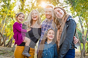 Happy Mixed Race Family Members Having Fun Outdoors