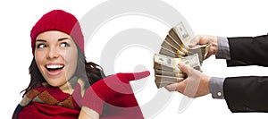 Happy Mixed Race Young Woman Being Handed Thousands of Dollars photo