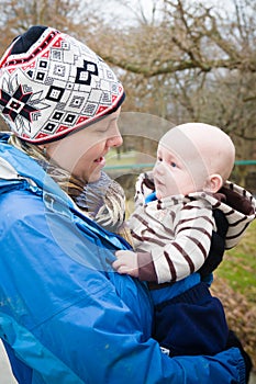 Happy Mom and Baby Talking