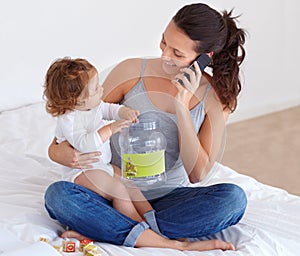 Happy, mom and phone call with baby in home talking on bed with child playing with toys, Smartphone, conversation and