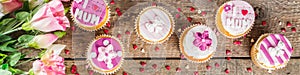 Happy moms day background with cupcakes