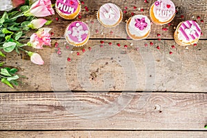 Happy moms day background with cupcakes