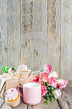 Happy moms day background with cupcakes