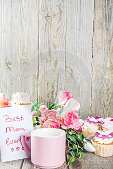 Happy moms day background with cupcakes