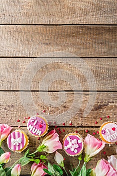Happy moms day background with cupcakes