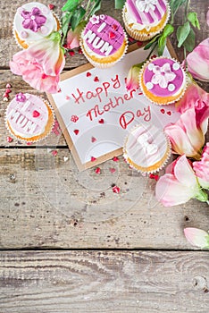 Happy moms day background with cupcakes