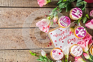 Happy moms day background with cupcakes