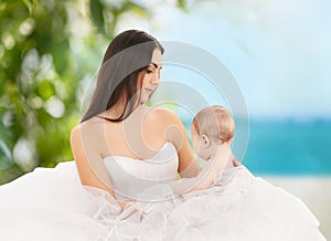 Happy mother with adorable baby