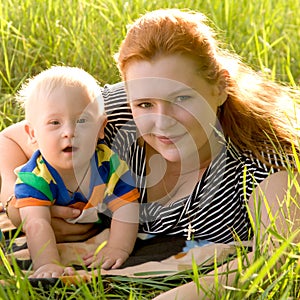 Happy mother and baby with Down syndrome