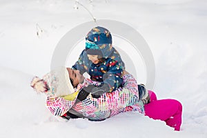 Happy mother and boy having fun