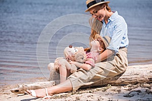 Mother and daughter at seashore
