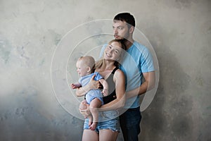 Happy mother, father and son playing