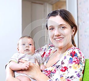 Happy mother with her 3 month baby