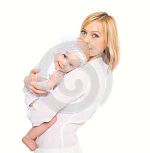 Happy mother hugging baby on white background