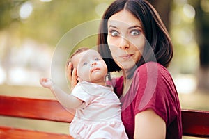 Happy Mother Kissing Her Cute Adorable Baby Girl