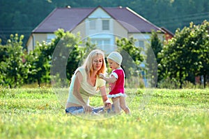 Happy mother and little child