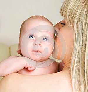 Happy mother with newborn baby