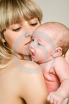 Happy mother with newborn baby