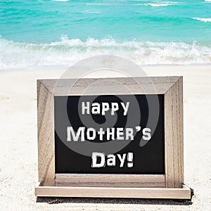 Happy Mother`s day background on the sandy beach