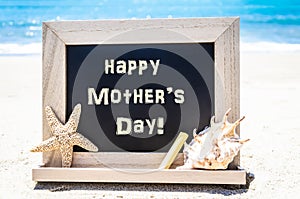 Happy Mother`s day background with seashell and starfish on the