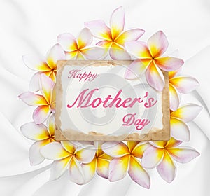 Happy Mother\'s day card with flower on white fabric background
