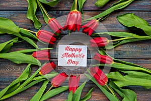 Happy Mother`s Day card with red tulips