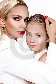 Happy mother`s day! child daughter and mother embraced, cuddling - Image