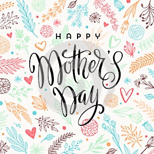 Happy mother`s day - Greeting card. Brush calligraphy on floral hand drawn pattern background.