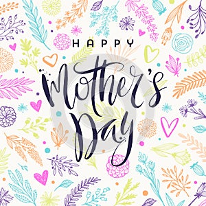 Happy mother`s day - Greeting card. Brush calligraphy on floral hand drawn pattern background.