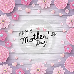 Happy mother`s day message and pink flowers with hearts on wood