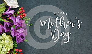 Happy Mother`s Day Text with Flowers Bouquet and Black Texture Background