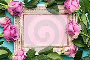 Happy Mother`s Day, Women`s Day or Birthday Flat Lay Background. Beautiful wooden vintage picture frame, fresh pink roses.