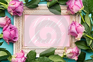 Happy Mother`s Day, Women`s Day, Valentine`s Day or Birthday Flat Lay Background. Beautiful picture frame, fresh pink roses.