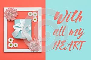 Happy Mother`s Day, Women`s Day, Valentine`s Day or Birthday Living Coral Background. Floral flat lay minimal concept with a gift.