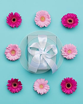Happy Mother`s Day, Women`s Day, Valentine`s Day or Birthday Pastel Blue Candy Colour Background. Floral flat lay minimal concept.