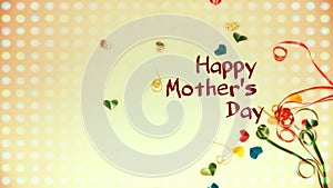 Happy Mother`s Day words with small colorful heart shaped and gift boxes as background.