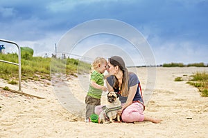 Happy mother and son at the beach