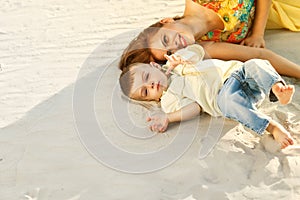 Happy mother and son playing