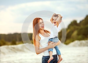 Happy mother and son playing