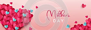 Happy Mothers Day banner. Holiday background design with big heart made of pink, red and blue Origami Hearts on soft pink