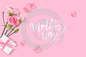 Happy Mothers day. Calligraphic greeting text. Holiday design template with realistic pink carnation flowers. photo